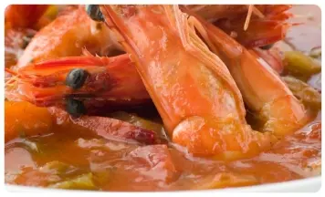 PREPARADO DE PAELLA CON GAMBÓN
