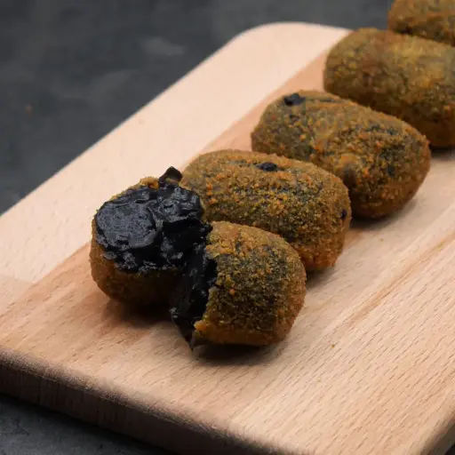[0053] CROQUETA CHIPIRÓN EN SU TINTA (Caja 4kg)