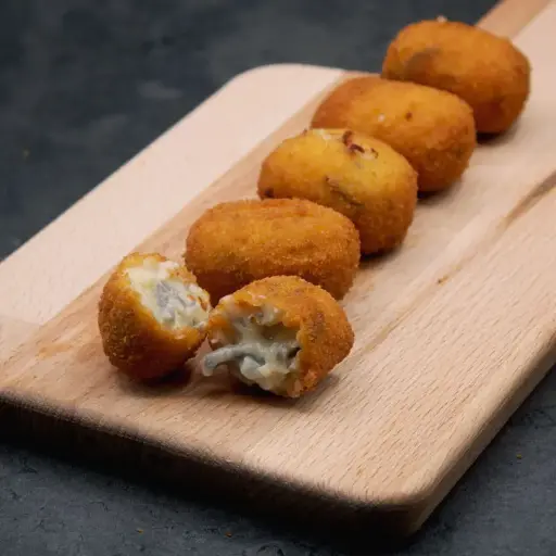 [0413] MINI CROQUETA GULAS AL AJILLO( CAJA 4 KG)
